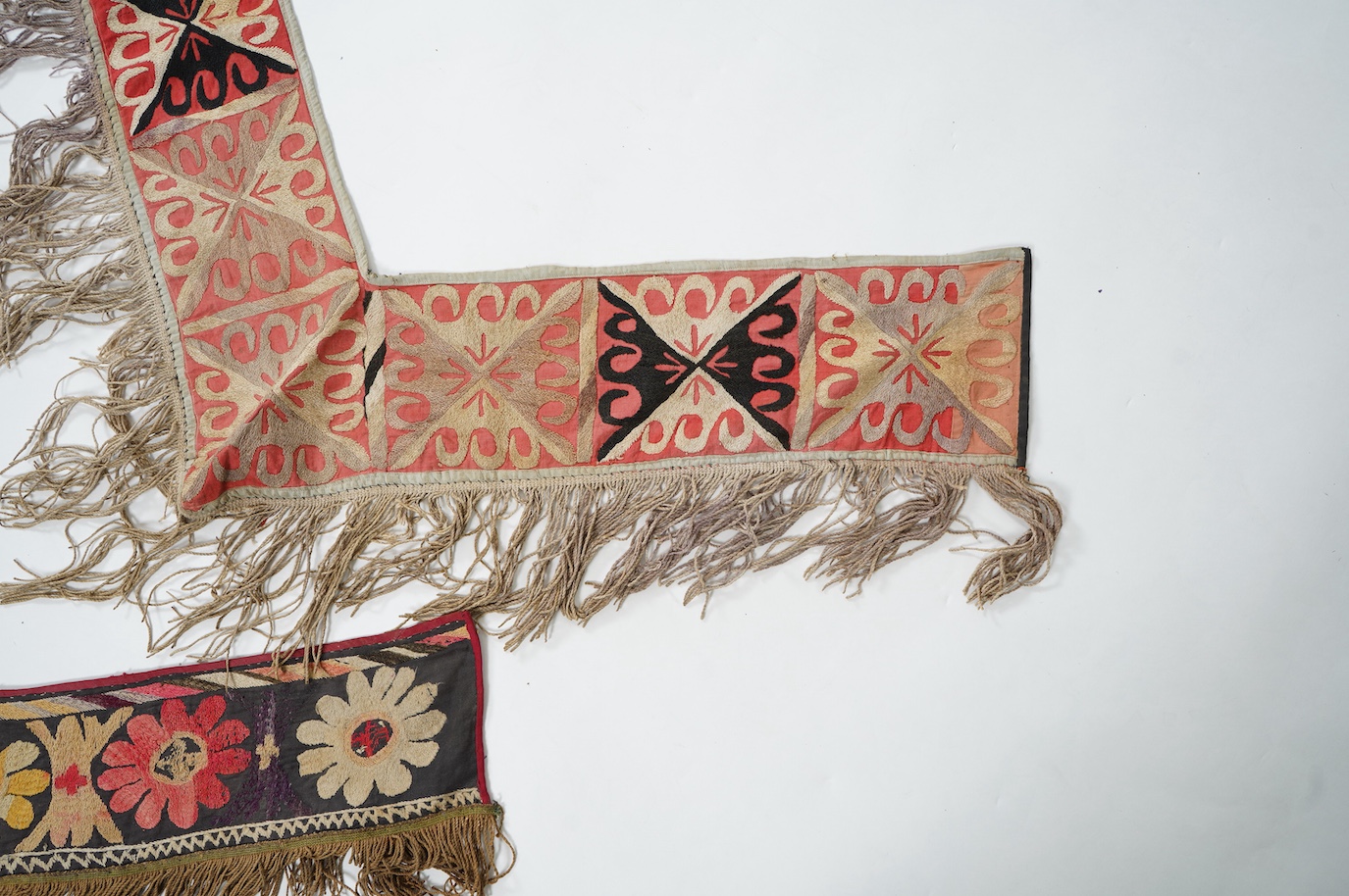 Five various sized late 19th / early 20th century Usbek Saye Gosha (V shaped) Suzani silk embroidered bridal yurt wall hangings, usually forming part of a dowry, two with later fringing, longest 172cm. Condition - some f